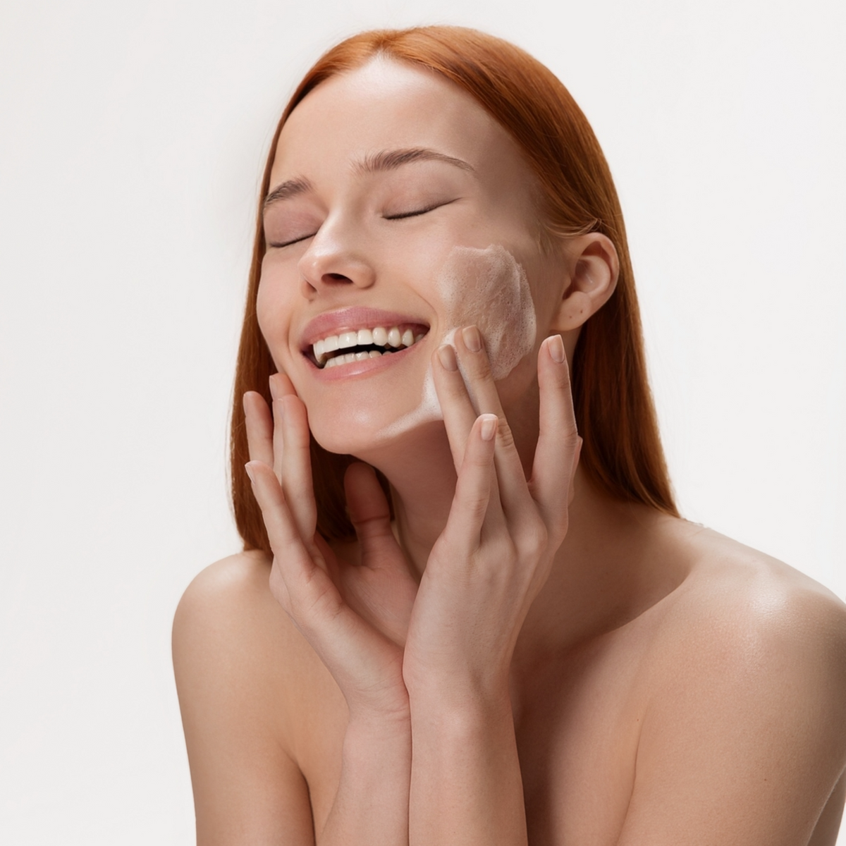 Woman cleansing her face with MUSE cleansing foam